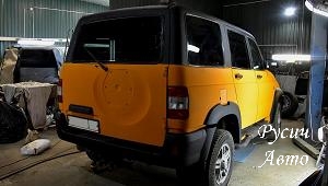 Двухцветная покраска Раптором, черно-оранжевый УАЗ Патриот
